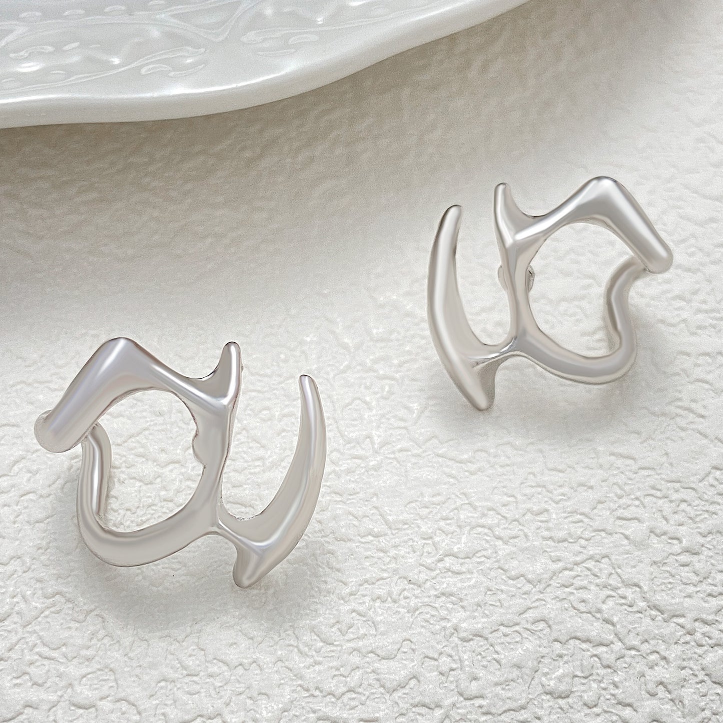 Cold Wind Irregular Liquid Hollow Ear Stud Earrings