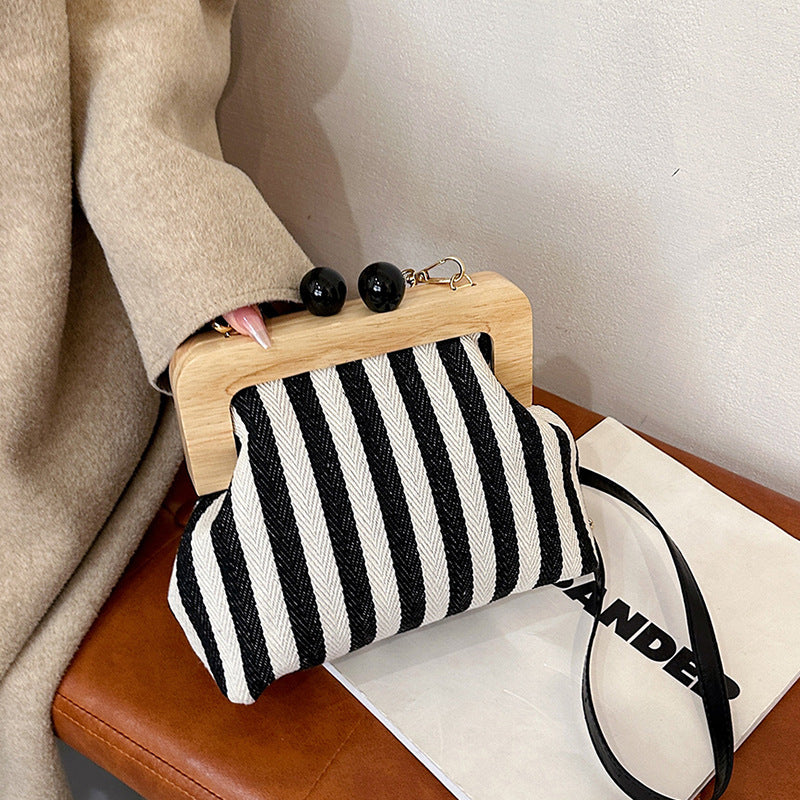 Striped Canvas Wooden Clip-mouth Clutch Bag